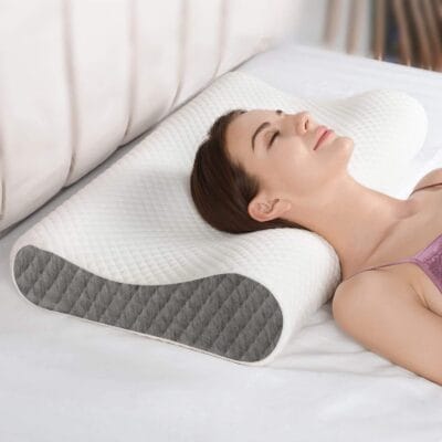 Ergonomic cervical memory foam pillow with a breathable cover, providing spinal alignment and pain relief for a restful sleep.