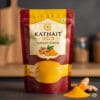 Kathait Gold Turmeric Powder 500g stand-up pouch, vibrant gold and red, with turmeric roots and powder visible.