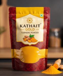 Kathait Gold Turmeric Powder 500g stand-up pouch, vibrant gold and red, with turmeric roots and powder visible.